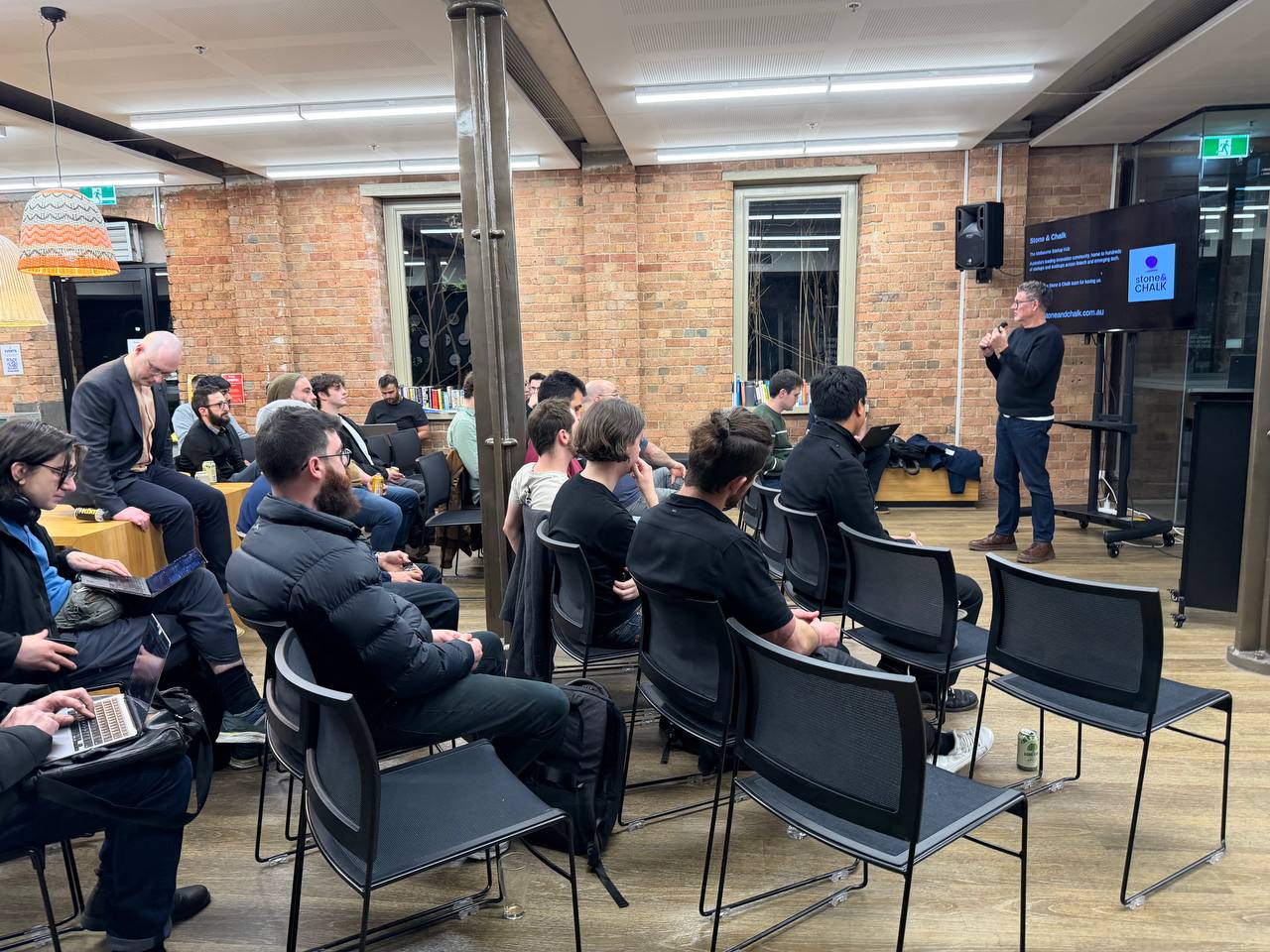 Host opening the August meetup