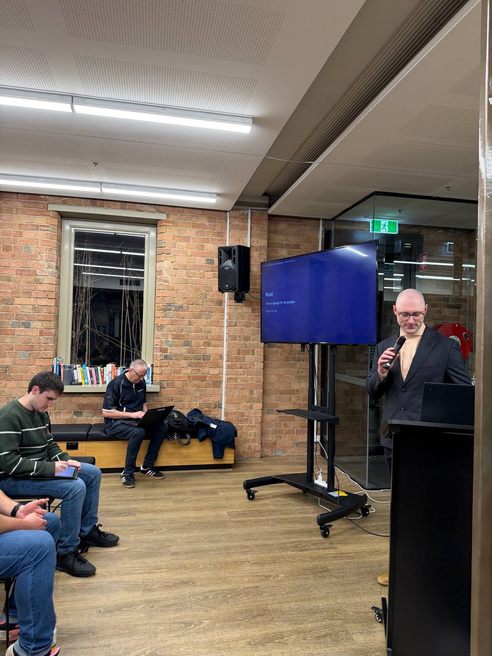 Speaker introducing Rust